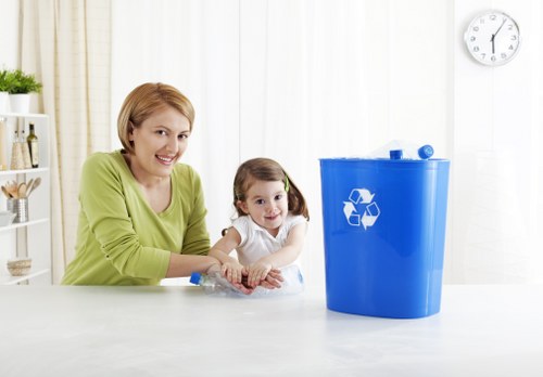 Professionals organizing garage items